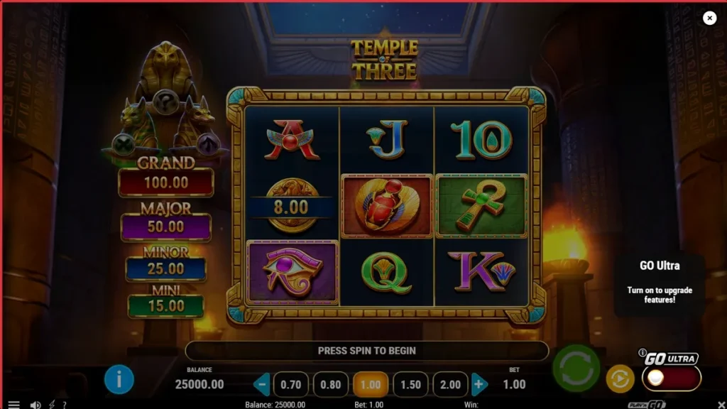 Temple of Three slot machine interface featuring Egyptian deity statues and golden coins.